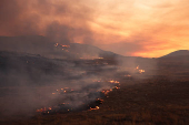 Firefighters tackle the Madre Fire near New Cuyama
