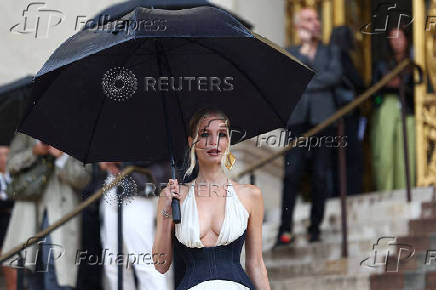 Guests arrive at Schiaparelli Haute Couture Fall/Winter 2025-2026 show in Paris
