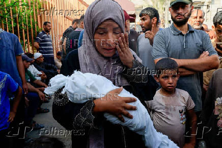 Palestinian mother mourns 3-month-old who died due to malnutrition, according to medics, in Khan Younis