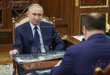 Russian President Putin meets Omsk Region Governor Khotsenko in Moscow