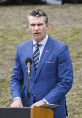 U.S. Defense Secretary Hegseth delivers a speech during a memorial service to mark the 80th anniversary of the battle of Iwo Jima