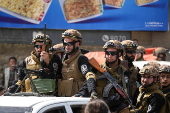 Syrian Democratic Forces (SDF) fighters convoy leaves Aleppo