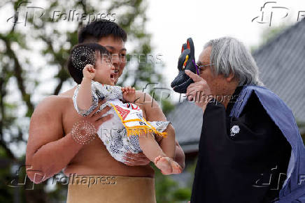 Babies take part in 'Nakizumo' or baby crying sumo contest at Senso-ji temple in Tokyo