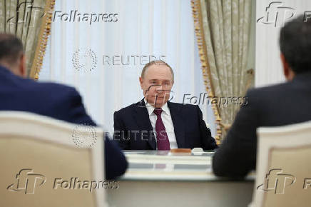 Russian President Vladimir Putin meets with Iranian Foreign Minister Abbas Araqchi in Moscow