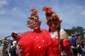 Revellers attend Glastonbury Festival at Worthy Farm in Pilton