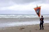 A member of the Orange Order pictured following a march along the beach in Rossnowlagh in County Donegal