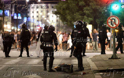 Serbia's police intervene to end standoff between ruling party supporters and anti-government protesters in Belgrade