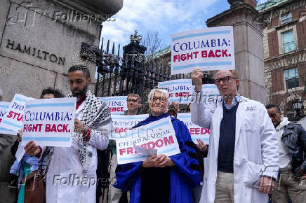 Members of Columbia Medical staff and faculty protest against federal funding cuts at Columbia University in New York
