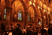Worshippers participate in Stations of the Cross at St Mary’s Catholic Cathedral in Sydney