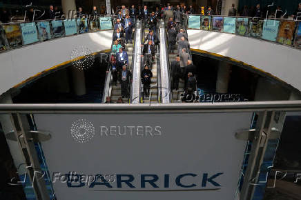 FILE PHOTO: The logo of sponsor Barrick Gold Corporation is seen as visitors arrive during the PDAC convention in Toronto