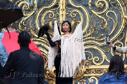 Guests arrive at Schiaparelli Haute Couture Fall/Winter 2025-2026 show in Paris