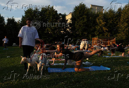 People practice yoga with baby goats in Moscow