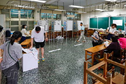 Voters cast their ballots in recall election for several Taiwanese legislators