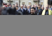 Ukrainian President Zelensky visits site of Russian missile strike in Kyiv