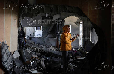 Aftermath of an Israeli strike on a house, in Khan Younis