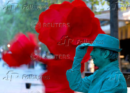 Live statue artists perform to mark World Art Day in Skopje