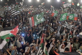 Supporters of Islamic organization Jamiat Ulema-e-Islam rally in Lahore in solidarity with Palestinians