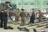 North Korea's leader Kim tours military equipment facility