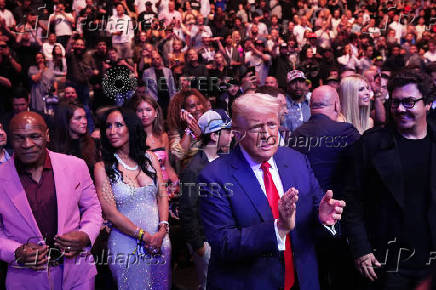 U.S. President Donald Trump attends the UFC-316 mixed martial arts event, in Newark