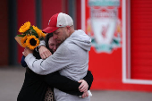 Fans pay their respects to late soccer player Diogo Jota, at Anfield Stadium in Liverpool