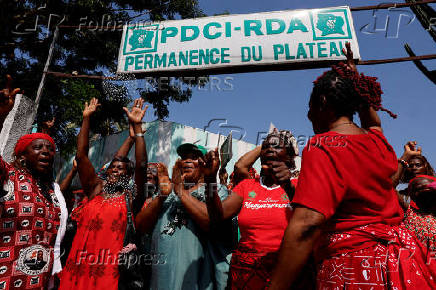 Partisans of PDCI (Democratic Party of Cote d'Ivoire) protest at their headquarters in Abidjan