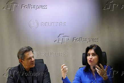 Brazil's Finance Minister Haddad and Brazil's Planning and Budget Minister Tebet attend a press conference in Brasilia