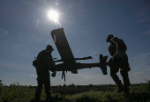 Members of the National Police Special Purpose Battalion prepare an unmanned aerial vehicle for reconnaissance flight on a front line in Zaporizhzhia Region