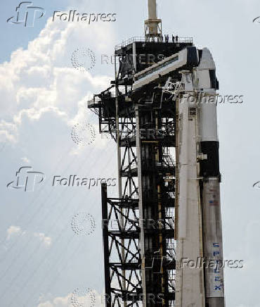 A Falcon 9 rocket stands at the pad before its upcoming launch of the Axiom-4 crewed mission to the International Space Station