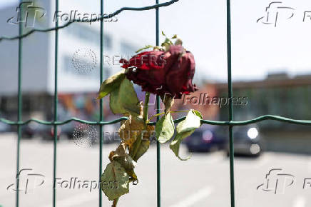 FILE PHOTO: Flowers and candles are seen in front of the fences of the school in Graz