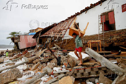 Erick weakens to tropical storm over Mexico, leaves trail of damage