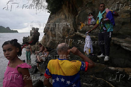 People celebrate Saint John the Baptist, in Ocumare de la costa