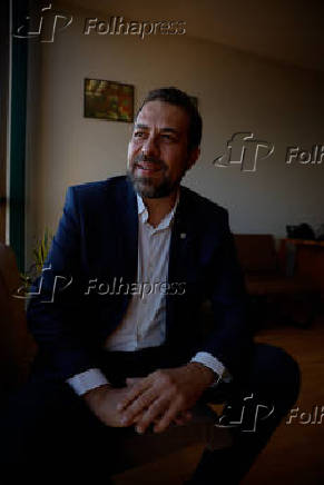 Guilherme Boulos em entrevista na Câmara dos Deputados