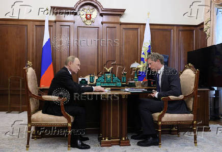 Russian President Vladimir Putin meets with head of the Federal Taxation Service Daniil Yegorov in Moscow