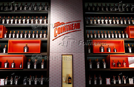 FILE PHOTO: Bottles of Cointreau displayed in the Carre Cointreau at the Cointreau distillery in Saint-Barthelemy-d'Anjou near Angers