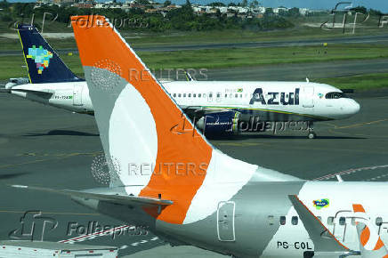 FILE PHOTO: Gol and Azul airlines planes are pictured at Luis Eduardo Magalhaes International Airport in Salvador