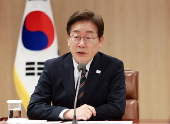 South Korean president Lee attends emergency economic meeting