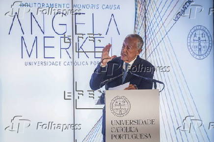 Angela Merkel receives honorary doctorate from Catholic University of Portugal