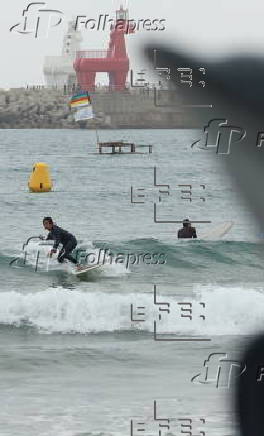 Surfing off of Jeju Island