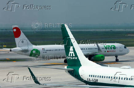 Planes of military-run airline Mexicana de Aviacion are parked at Felipe Angeles International Airport (AIFA), in Zumpango