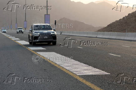 Vehicles drive over rumble strips that play Ludwig van Beethoven's Ninth Symphony on a highway dubbed 'Musical Road' in Fujairah