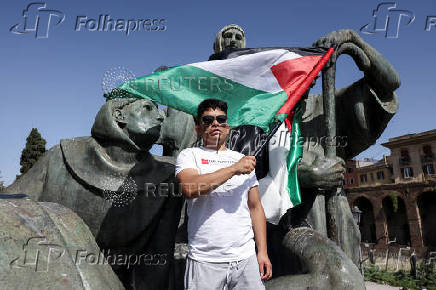 Pro-Palestinian protesters attend a demonstration calling for an end to the bombing in Gaza, in Rome