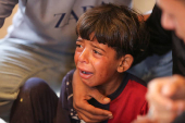 Funeral of a Palestinian killed, in what the Gaza health ministry says was Israeli fire near a distribution center in Rafah, at Nasser hospital in Khan Younis