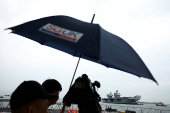 Britain's HMS Prince of Wales aircraft carrier arrives at Marina Bay Cruise Centre in Singapore