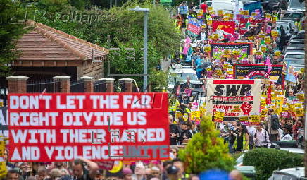 Protest against far-right campaigners targeting migrants in Epping