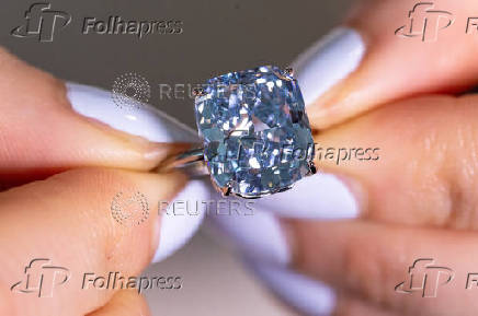A Sotheby?s staff holds 