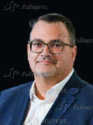 liver Burkhard, CEO of Thyssenkrupp Marine Systems, poses for the media in Kiel