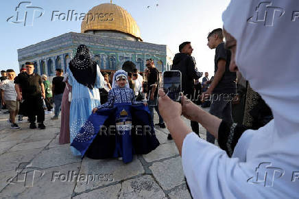 Palestinians pray on the first day of the Muslim holiday of Eid al-Adha, in Jerusalem's Old City