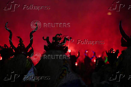 Bolivians celebrate the Gran Poder parade, in La Paz