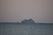 A view of the Crown Iris, a vessel which will be used to assist in the departure of Israelis from Cyprus,  is seen off the coast of Larnaca