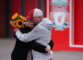 Fans pay their respects to late soccer player Diogo Jota, at Anfield Stadium in Liverpool
